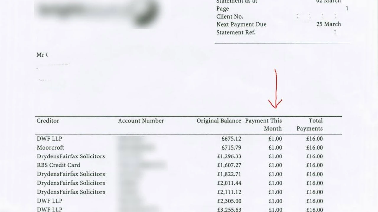 Close up on a plate of mashed potatoes, topped with baked pork chops with cream of mushroom soup, and a side of green beans.