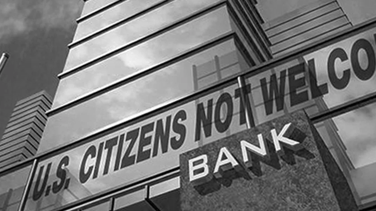 Close up on a plate of mashed potatoes, topped with baked pork chops with cream of mushroom soup, and a side of green beans.